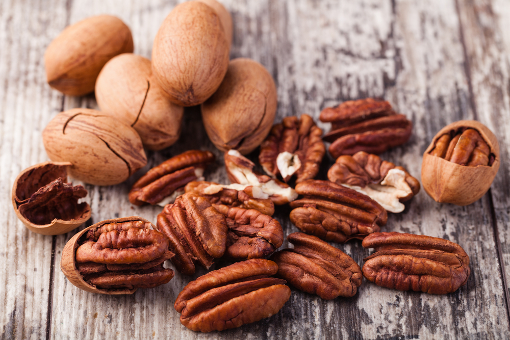 Pecan nuts on a wooden table